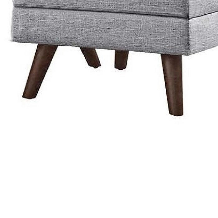 Fabric Upholstered Ottoman With Tappered Wooden Legs, Light Gray and Brown