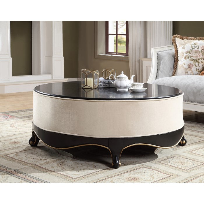 Round Wooden Cocktail Table with Fabric Center and Sabre Leg Support, Brown and Cream