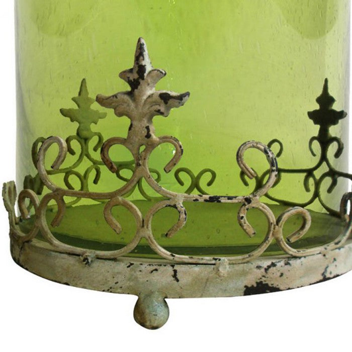 Traditional Style Glass Candle Holder With Scrolled Metal Stand, Green