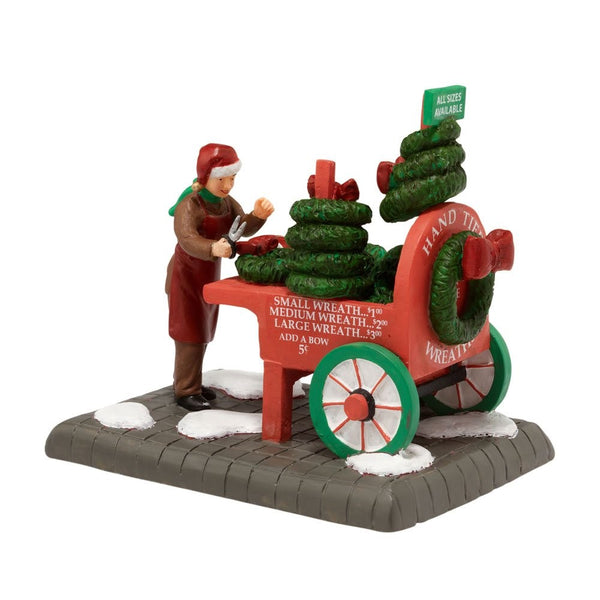 Department 56 Christmas in the City Village City Wreath Seller Accessory Figurine