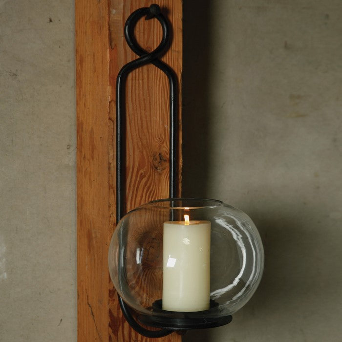 Metal Frame Wall Sconce with Round Glass Hurricane, Black and Clear