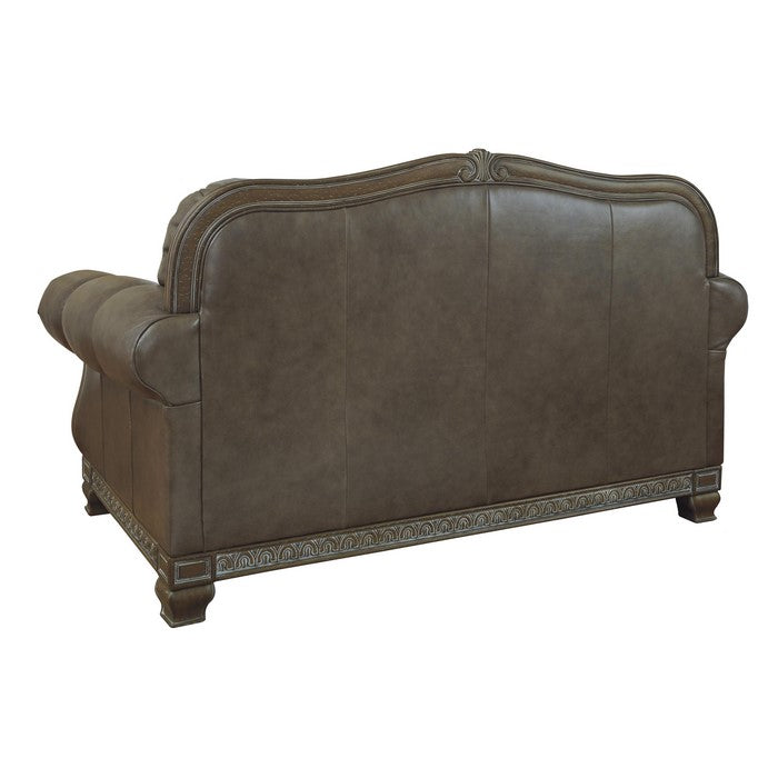 Crown Top Leatherette Wooden Frame Loveseat with Engraved Apron, Brown