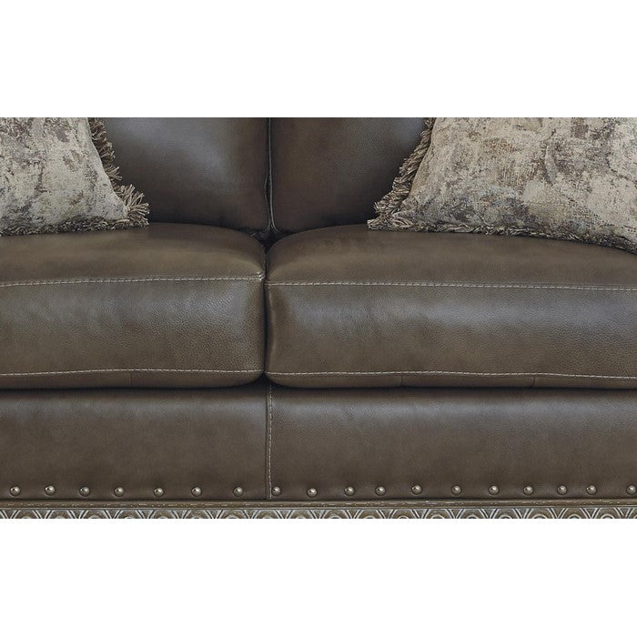 Crown Top Leatherette Wooden Frame Loveseat with Engraved Apron, Brown