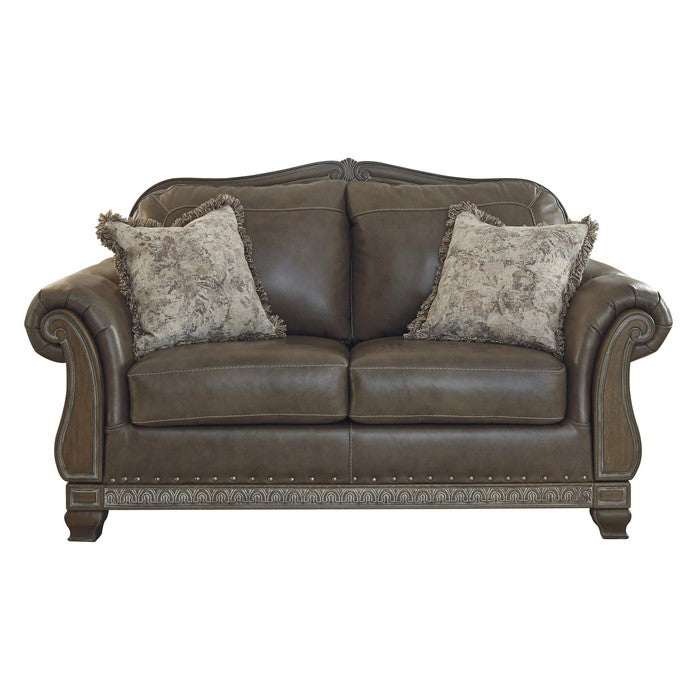 Crown Top Leatherette Wooden Frame Loveseat with Engraved Apron, Brown