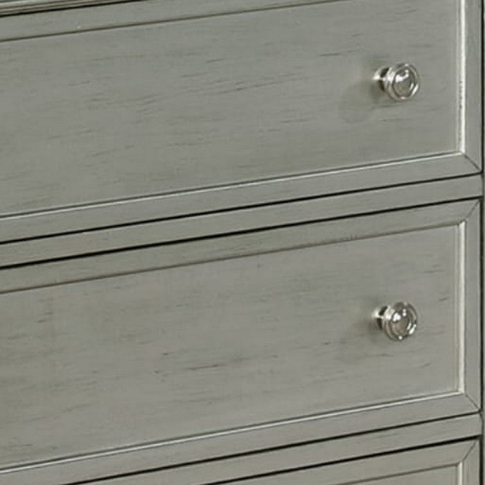 Wooden Dresser with Nine Drawers and Mirror Accents, Silver