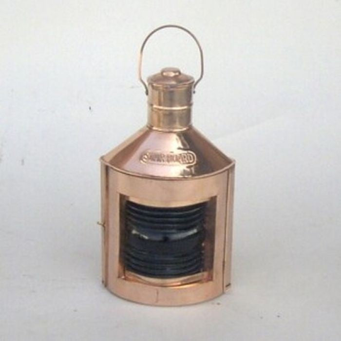 A HANDTOOLED HANDCRAFTED COPPER PORT OIL LAMP