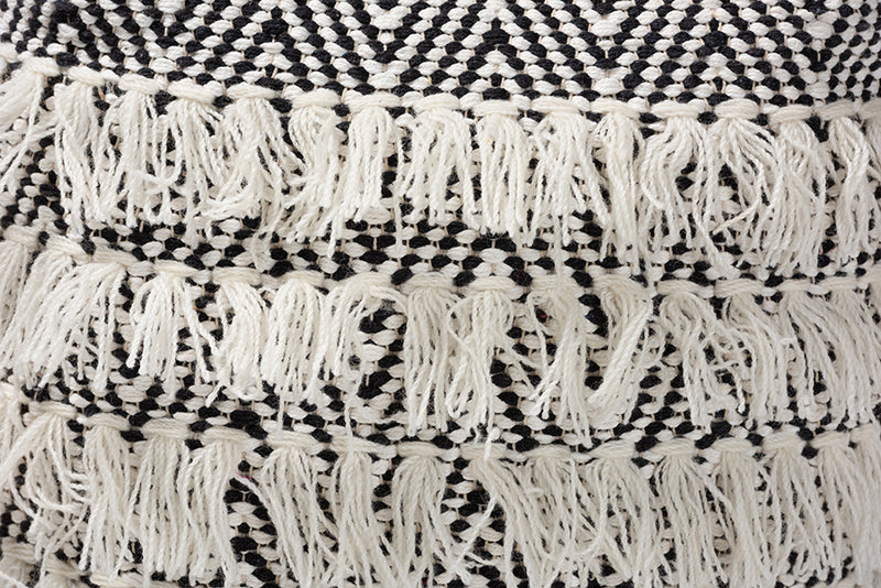 Baxton Studio Alain Moroccan Inspired Black and Ivory Handwoven Wool Tassel Pouf Ottoman